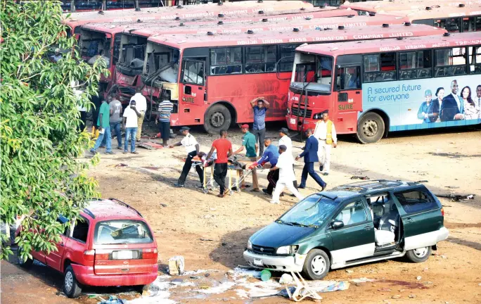  ?? PHOTO Abubakar Yakubu ?? Scene of the bomb blast at Nyanya Bus Terminus in Abuja yesterday.