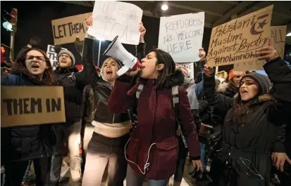  ??  ?? Guiding the resistance
Because it anticipate­d what a Trump presidency might entail, the ACLU was positioned to act quickly—and mobilize its supporters—to combat Trump’s so-called travel bans.