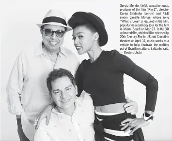  ??  ?? Sergio Mendes (left), executive music producer of the film “Rio 2”, director Carlos Saldanha (centre) and R&B singer Janelle Monae, whose song “What is Love” is featured in the film, pose during a publicity tour for the film in Miami Beach on Mar 23....