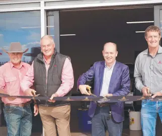  ?? ?? Mick O’grady (Elders branch manager), Malcolm Hunt (Elders executive general manager), Paul Mciver (Goldtower executive director) and Cr Frank Beveridge (Charters Towers Mayor) at the opening of the new store.