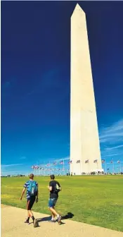  ?? KATHERINE RODEGHIER/CHICAGO TRIBUNE ?? Putting people in a photo adds perspectiv­e to an image of the Washington Monument.