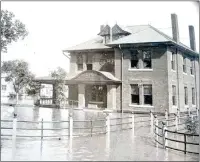  ?? Courtesy photos ?? Right, the building had just been completed when heavy rainfall and flooding began June 24-26, 1902.