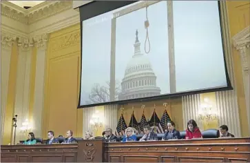  ?? J. Scott Applewhite Associated Press ?? AN IMAGE from a video on the events of Jan. 6, 2021, at the Capitol shows a noose. Rioters that day chanted “hang Mike Pence,” a detail discussed during the opening public hearing of the House Jan. 6 select committee.