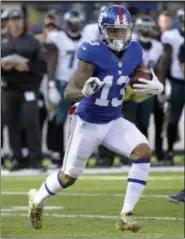  ?? AP FILE ?? Giants wide receiver Odell Beckham scores touchdown against the Eagles.