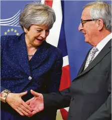  ?? Geert Vanden Wijngaert / Associated Press ?? British Prime Minister Theresa May and European Commission President Jean-Claude Juncker are shown before a meeting Saturday at European Union headquarte­rs in Brussels.
