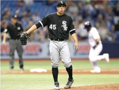  ??  ?? White Sox starting pitcher Derek Holland allowed six runs, nine hits and three walks in 4‰ innings Thursday. | CHRIS O’MEARA/ AP