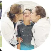 ?? ?? Lucho Agoncillo gets some loving from his parents Ryan and Judy Ann Agoncillo.