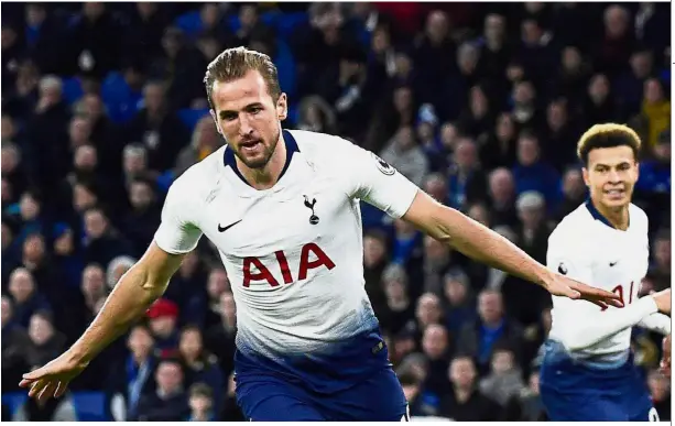  ??  ?? Flying high: Tottenham’s Harry Kane celebratin­g after scoring the first goal against Cardiff in the Premier League match on Tuesday. — Reuters