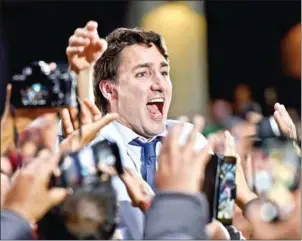  ??  ?? Canada’s Justin Trudeau speaks to a crowd in a last-ditch effort to secure votes before the country casts its ballots on Monday.