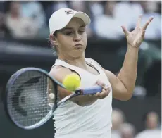  ??  ?? Ash Barty plays a forehand during her quarter-final win