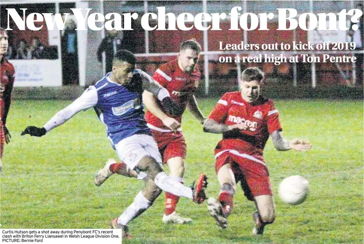  ?? PICTURE: Bernie Ford ?? Curtis Hutson gets a shot away during Penybont FC’s recent clash with Briton Ferry Llansawel in Welsh League Division One.