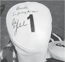  ?? CHRIS STEVENSON ?? Phil Mickelson signed Brooke Henderson’s driver head cover on Monday. The two competed in a skills competitio­n held ahead of the KPMG Women’s PGA Championsh­ip, which starts Thursday.