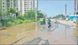  ?? SAKIB ALI /HT ?? This road in Raj Nagar Extension is riddled with potholes filled with stagnant water.