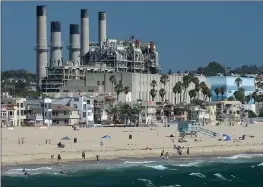  ?? STAFF FILE PHOTO ?? The AES Redondo Beach power plant was originally scheduled to close at the end of 2020, then at the end of 2021. Now, regulators are considerin­g extending the life of the outdated plant through 2023 to help avoid blackouts during heatwaves.