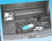  ??  ?? under charger stored Portable electric the boot floor.