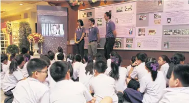  ?? PHOTOS BY APICHIT JINAKUL ?? Sathit Kaset students listen to a briefing of the school’s accomplish­ments created or inspired by the late professor Ubon Reangsuwan, the visionary who founded the school and pioneered its child-centred learning programme. The approach is now being adopted as a national education paradigm.