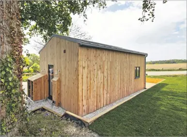  ??  ?? Buyers hoping to snap-up this static caravan-sized shack, which has three windows, will need to part with a cool quarter of a million pounds