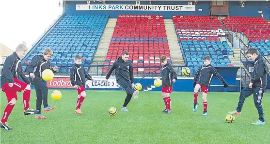  ?? Pictures: Paul Reid/Getty Images. ?? Montrose FC developmen­t officer Adam McWilliam coaching youngsters at Links Park. Below: Paris St-Germain’s Brazilian superstar Neymar.