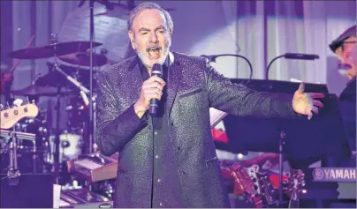  ?? AP PHOTO ?? In this Feb. 11, 2017, photo, Neil Diamond performs at the Clive Davis and The Recording Academy Pre-Grammy Gala in Beverly Hills, Calif.