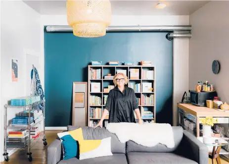  ?? JASON HENRY/THE NEW YORK TIMES ?? Andrea Burnett stands for a portrait in her office near Richmond, California. She donated clothing, appliances, lamps, furniture and art supplies.