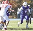  ?? Pete Paguaga / Hearst Connecticu­t Media ?? Lewis Mills’ Cade Cormier looks for running room against Berlin in Burlington on Saturday.