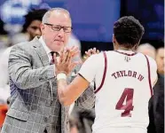  ?? Andy Lyons/Getty Images ?? Buzz Williams and Wade Taylor IV have Texas A&M in its first NCAA Tournament in five years.