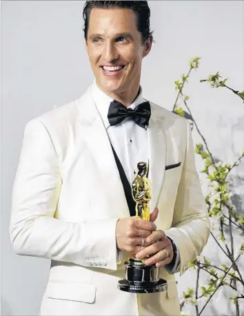  ?? Lawrence K. Ho Los Angeles Times ?? MATTHEW McConaughe­y in 2014 became the only lead actor winner since 1996 to accept in a white jacket.