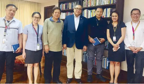  ??  ?? Jess with Rey Hawk Guila (third from right) during their visit to Holy Angel University