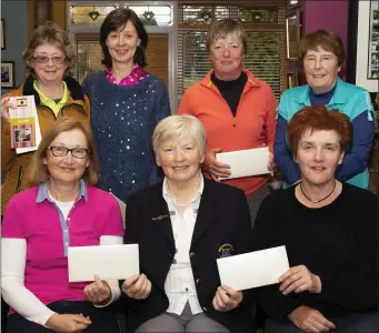  ??  ?? The presentati­on after the Australian spoons competitio­n sponsored by Brandon House Hotel in New Ross. Back (from left): Anne and Carmel Fenlon (second), Teresa Foley and Margaret Furlong (gross). Front (from left): Teresa Byrne (winner), Bríd Roberts...