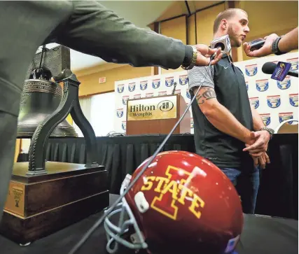  ?? JIM WEBER/THE COMMERCIAL APPEAL ?? Memphis quarterbac­k Riley Ferguson answers questions during a press conference at The Hilton Memphis on Sunday. The AutoZone Liberty Bowl announced that the Tigers will take on Iowa State in this year’s game, the first time since the game’s inception...