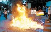  ?? ARIF ALI/GETTY-AFP ?? Outrage over deaths in Gaza at the hands of Israel roiled Lahore, Pakistan, where protesters burned a U.S. flag.