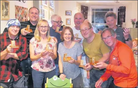  ??  ?? Members of Hinckley Mountainee­ring and Hill Walking Club travelled to Tremadoc in Snowdonia for the President’s Dinner, picture shows members with their “Tat” awards