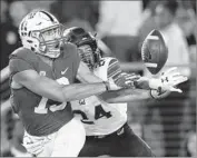  ?? Ezra Shaw Getty Images ?? CALIFORNIA’S Camryn Bynum, right, breaks up a pass intended for Stanford’s JJ Arcega-Whiteside.