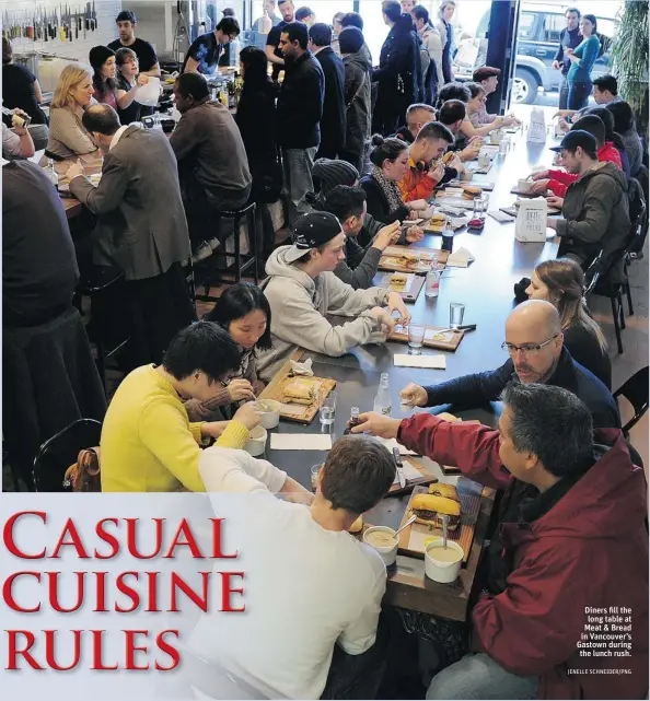  ?? JENELLE SCHNEIDER/ PNG ?? Diners fi ll the long table at Meat & Bread in Vancouver’s Gastown during the lunch rush.