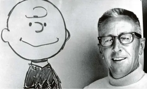  ?? Foto: UPI, dpa ?? Charles M. Schulz mit seinem gezeichnet­en Alter Ego Charlie Brown.