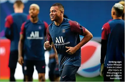  ??  ?? Striking sign: Kylian Mbappe trains in Lisbon
after injury, as PSG prepare to kick off the mini
tournament