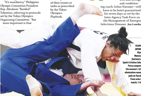  ?? AP ?? FILIPINOJA­PANESE Kiyomi Watanabe (bottom) and Spain’s Cristina Cabana Perez compete in the women’s -63-kg eliminatio­n round of judo on Tuesday. Perez wins the match, 1-0.