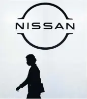  ??  ?? Nissan Motor Co’s new corporate brand logo is a simplified version of the prior design, with just two half-circles depicting the sun, fronted by the letters of the company’s name.