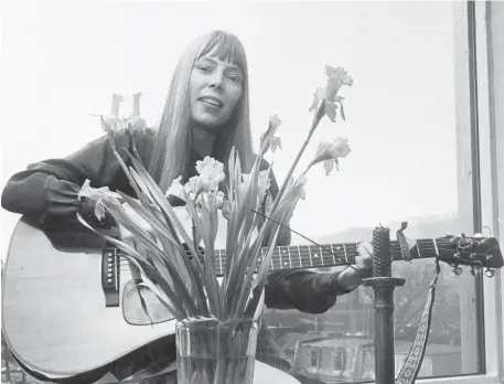  ?? ALLAN LEISHMAN ?? After author and critic Ann Powers completed her research on Joni Mitchell, she acknowledg­ed that the Canadian musical icon was a genius who set standards that were rarely met by others in lyrics, guitar-playing, compositio­n and studio wizardry.