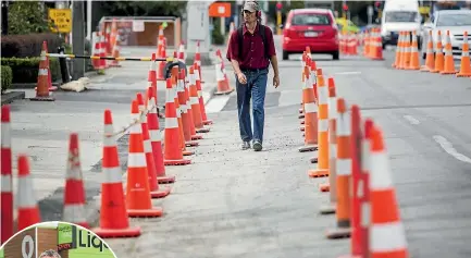  ?? PHOTO: JOSEPH JOHNSON/STUFF ?? Business owners hope an increase in the number of traffic cones don’t spell the return of major disruption for them and customers on Christchur­ch’s Riccarton Rd.