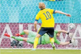  ?? Photo / AP ?? Emil Forsberg scored Sweden’s winner from the spot.