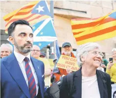  ??  ?? Ponsati and her lawyer Aamer Anwar leave the Sheriff Court in Edinburgh. — Reuters photo