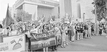  ??  ?? Participan­ts attend the annual Jerusalem Gay Pride parade. — AFP photo