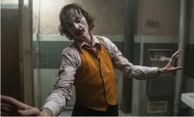  ??  ?? Show your hand … Joaquin Phoenix in Joker. Photograph: Niko Tavernise/AP
