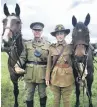  ?? PHOTO: PAM JONES ?? Trusty steeds . . . New Zealand Mounted Rifles Charitable Trust president Mark Appleton with Kruz and trust rider Anna Keehan with Ted.