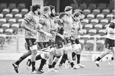  ?? - AFP photo ?? New Zealand’s rugby players warm up during a training session at the Forsyth Barr Stadium in Dunedin on June 21, 2018, ahead of the All Blacks’ third rugby Test match against France on June 23.