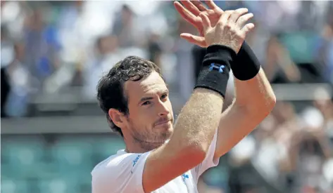  ?? PETR DAVID JOSEK/AP ?? Andy Murray celebrates his 6-3, 6-4, 6-4 fourth-round win over Karen Khachanov on Monday at the French Open in Paris.