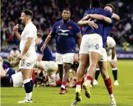 ?? ?? EMOTIONS France celebrate at end as England are stunned