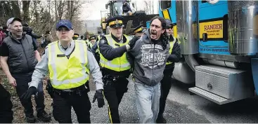  ?? — THE CANADIAN PRESS FILES ?? Protests against the Trans Mountain pipeline extension have resulted in 231 arrests to date, according to figures provided by the Crown. There have been 186 conviction­s or guilty pleas, with more trials scheduled.