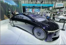  ?? ?? GAC Aion showcases the Time concept vehicle at the GuangdongH­ong Kong-Macao Greater Bay Area Internatio­nal Auto Show in May.